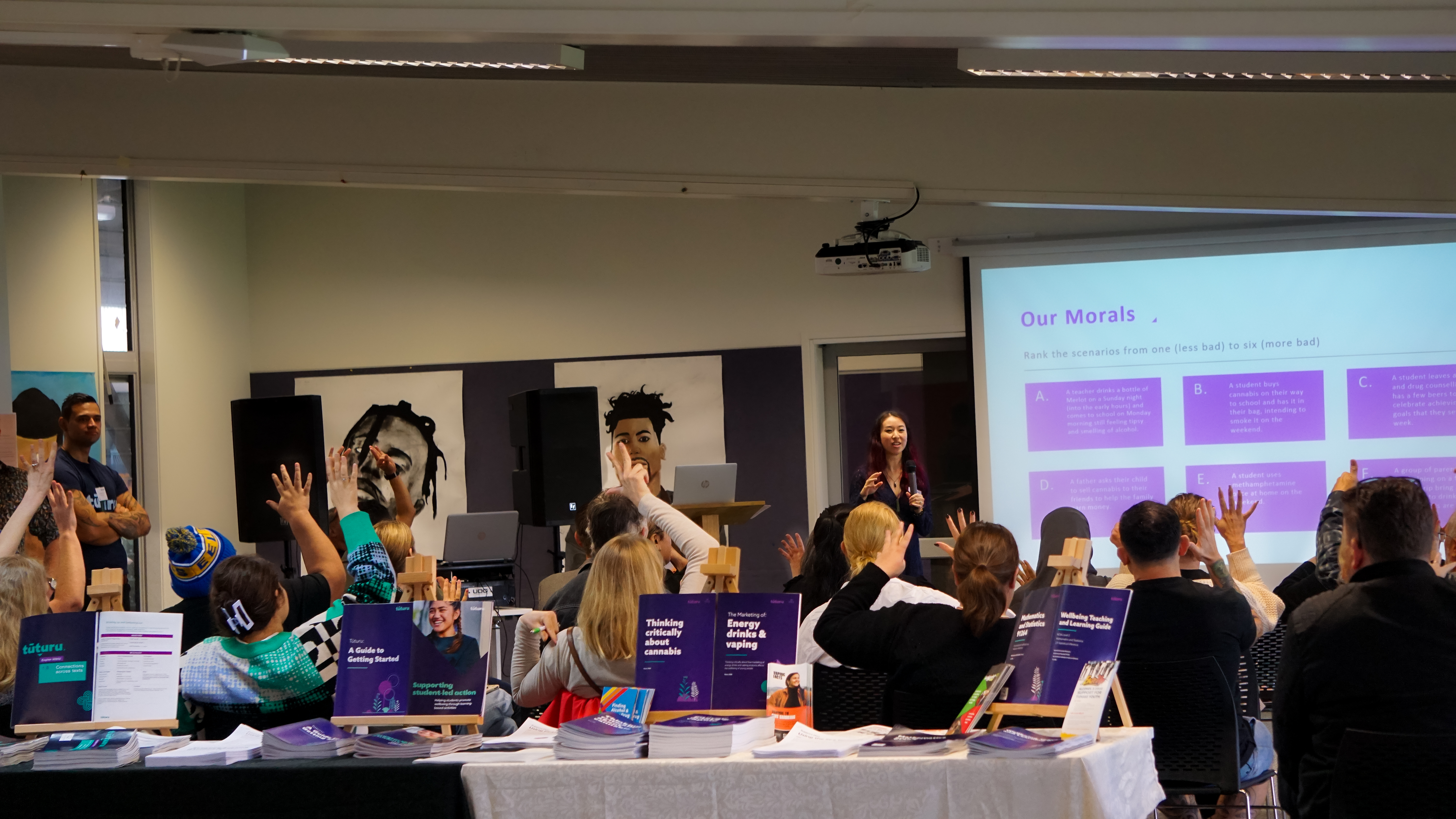 Odyssey's Alex Siu engages attendees at Auckland's Whole School Approach Day in an activity 